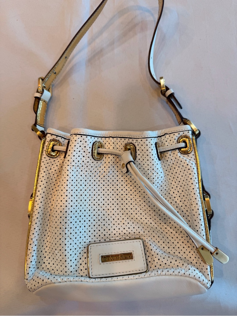 Calvin Klein White Perforated and Gold Drawstring Small Bucket Bag
